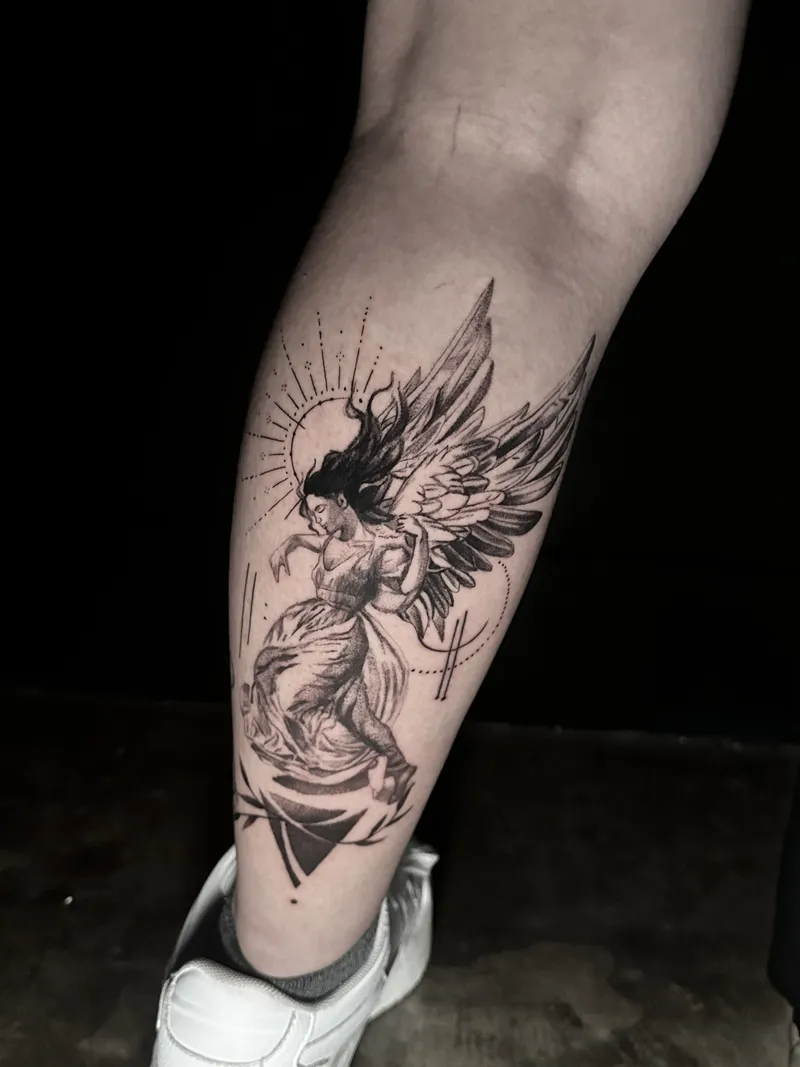 Black and grey winged angel with light rays on the calf