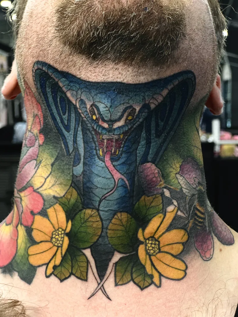 Colour snake and sunflowers tattoo wrapped around the neck