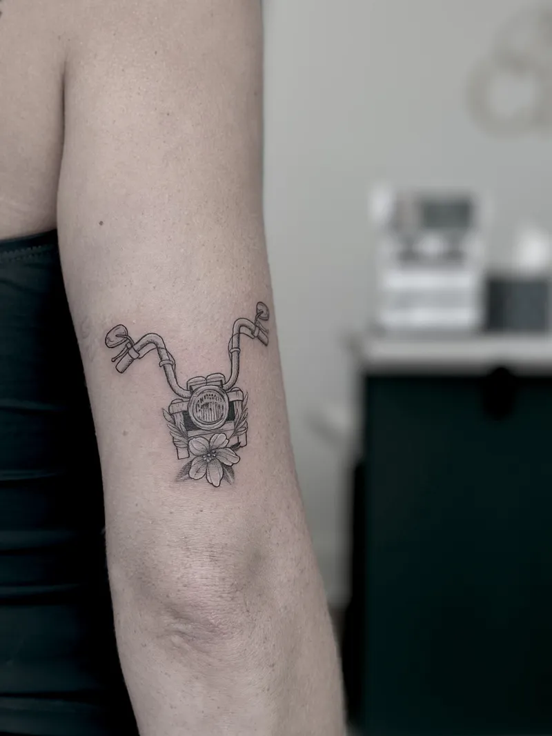 Tiny fine line character on the back of the arm